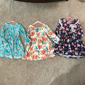 Lots of 3 fall dresses size medium or 3t